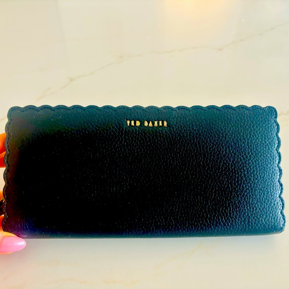 Black leather wallet in great condition. Not perfect but barely used.